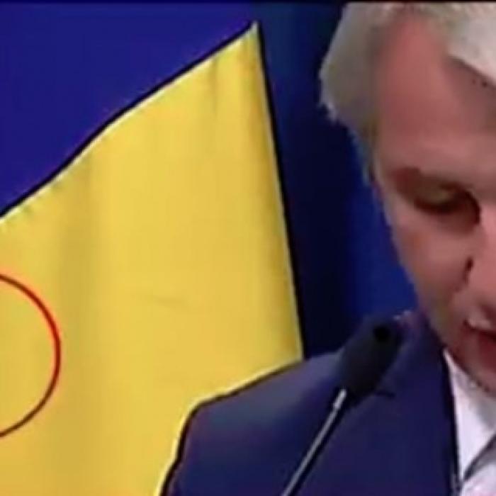 ”Invitat special” la conferința de presă a lui Eugen Teodorovici: Un GÂNDAC  pe drapelul României 
