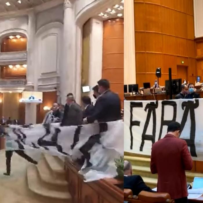 Scandal monstru în Parlament. Un deputat PSD a smuls bannerul uriaș adus de AUR