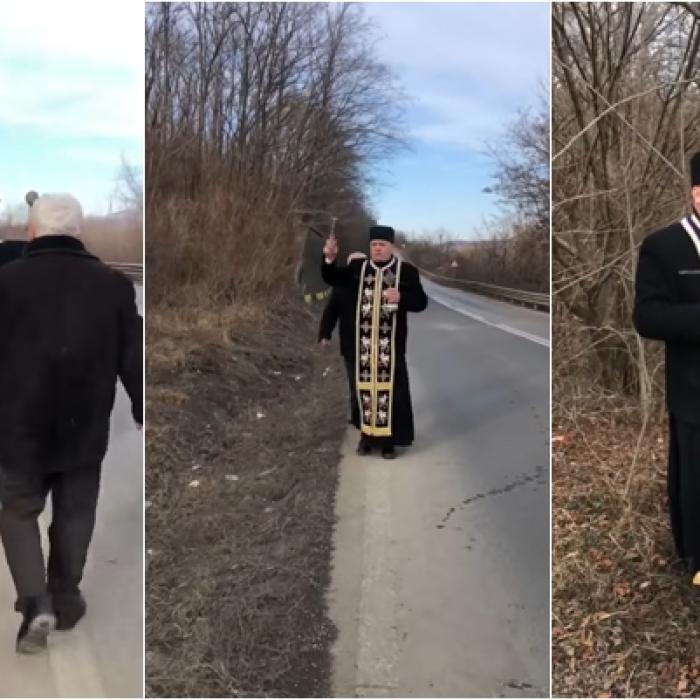 Imagini virale cu un preot care sfințește „curba morții” de pe DN11 - VIDEO