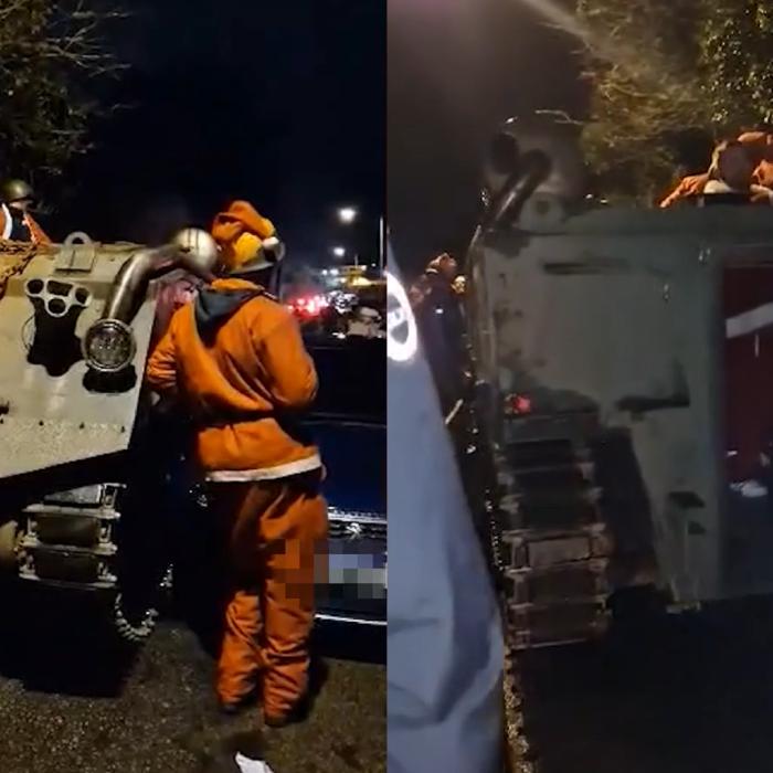 Mai mulți Moși Crăciuni "beți" au provocat haos după ce au rămas blocați într-un tanc pe un drum îngust din sat