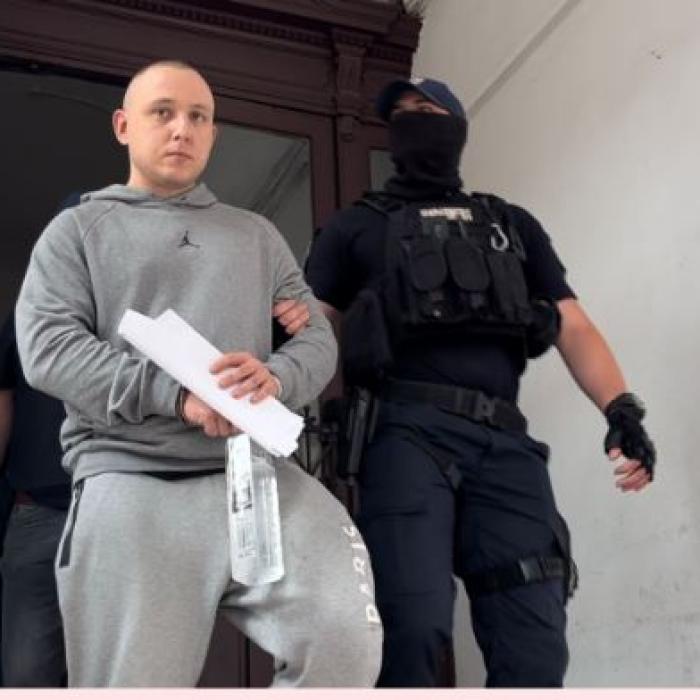 Tânăr român, fost olimpic la informatică și student de top, arestat la Cluj pentru trafic de persoane