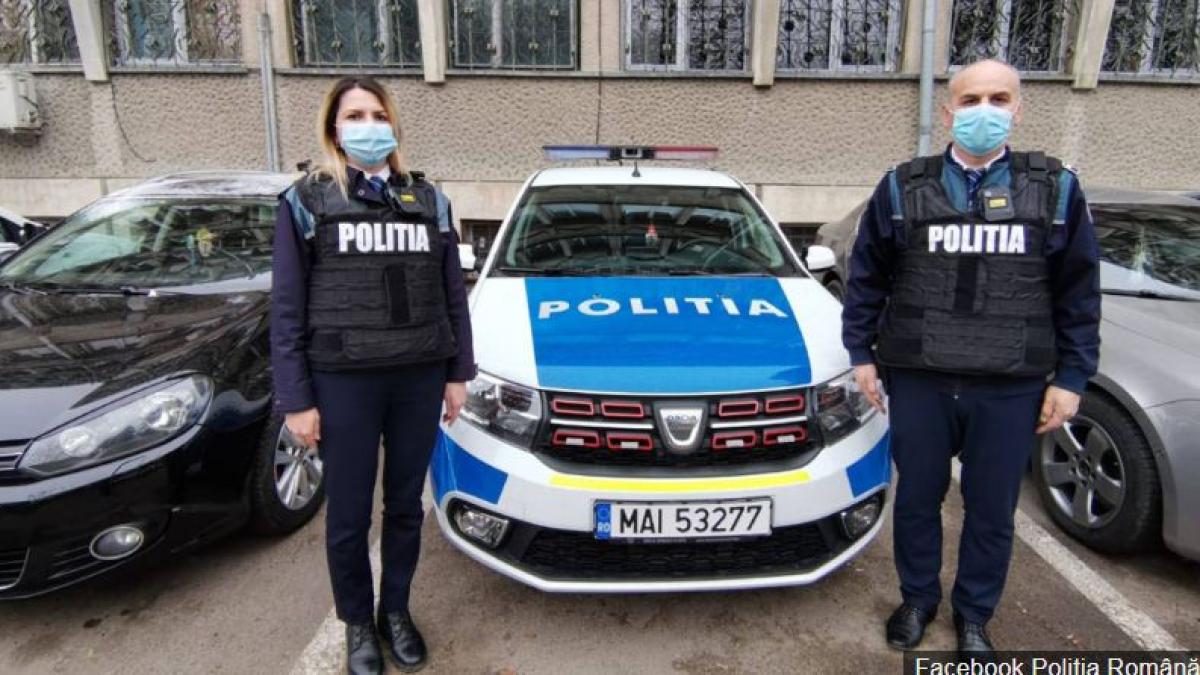 politisti_au_salvat_o_femeie_din_incediu