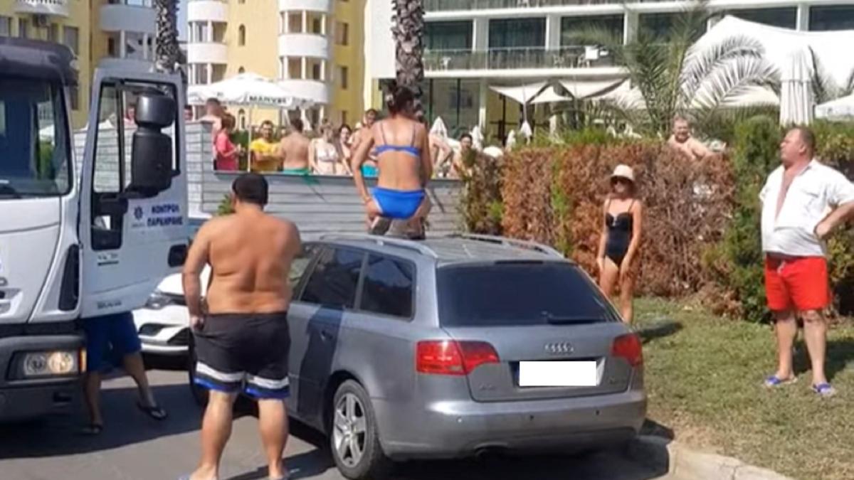 Bulgaria. O familie de români a făcut scandal: Femeia s-a urcat pe mașină pentru a împiedica autoritățile să i-o ridice - VIDEO