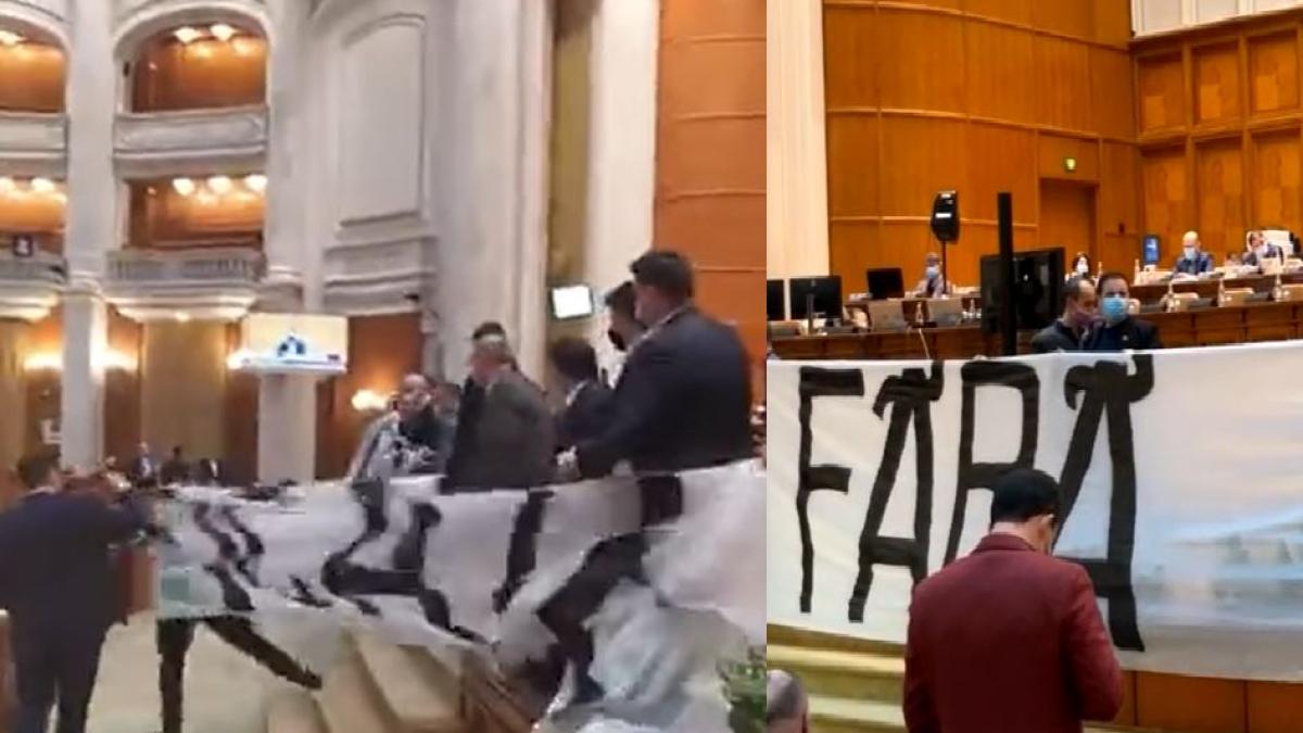 scandal-monstru-in-parlament--un-deputat-psd-a-smuls-bannerul-urias-adus-de-aur