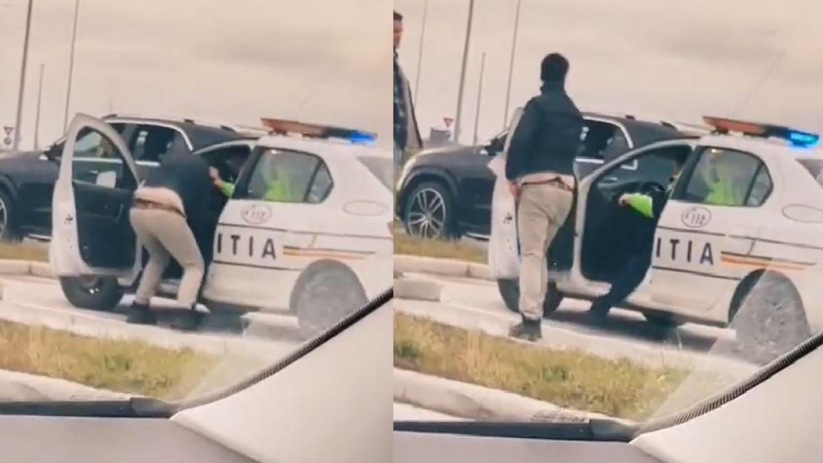 politist--umilit-de-un-sofer-care-a-intrat-peste-el-in-masina-sa-i-smulga-actele--godina---mi-e-jena-sa-ma-uit-la-acest-video