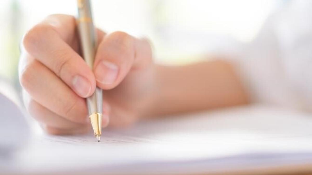 hand-with-pen-application-form_13051700