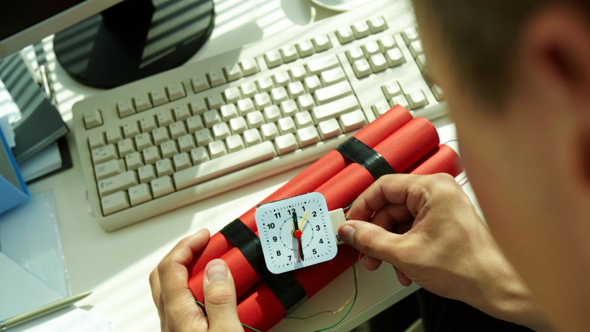 hands-close-up-man-preparing-bomb
