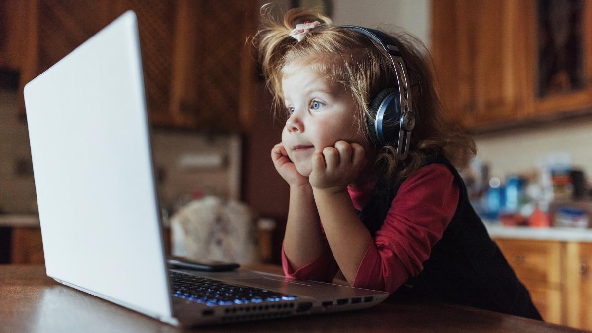 happy-beautiful-child-headphones-listening-music