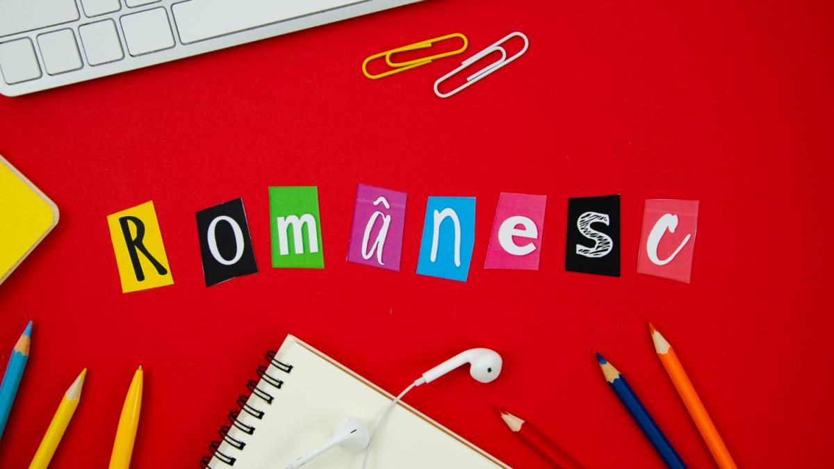 top-view-romanian-lettering-red-background_48994800