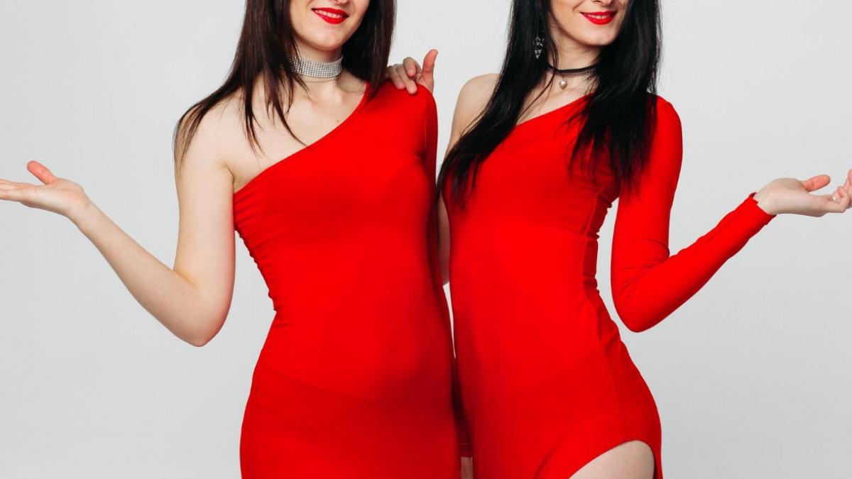 two-sexy-sisters-twins-red-dressesprc-7e2_21107100