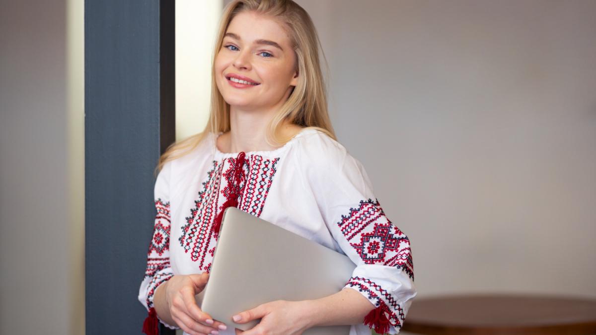 young-woman-wearing-embroidered-shirt_70193500