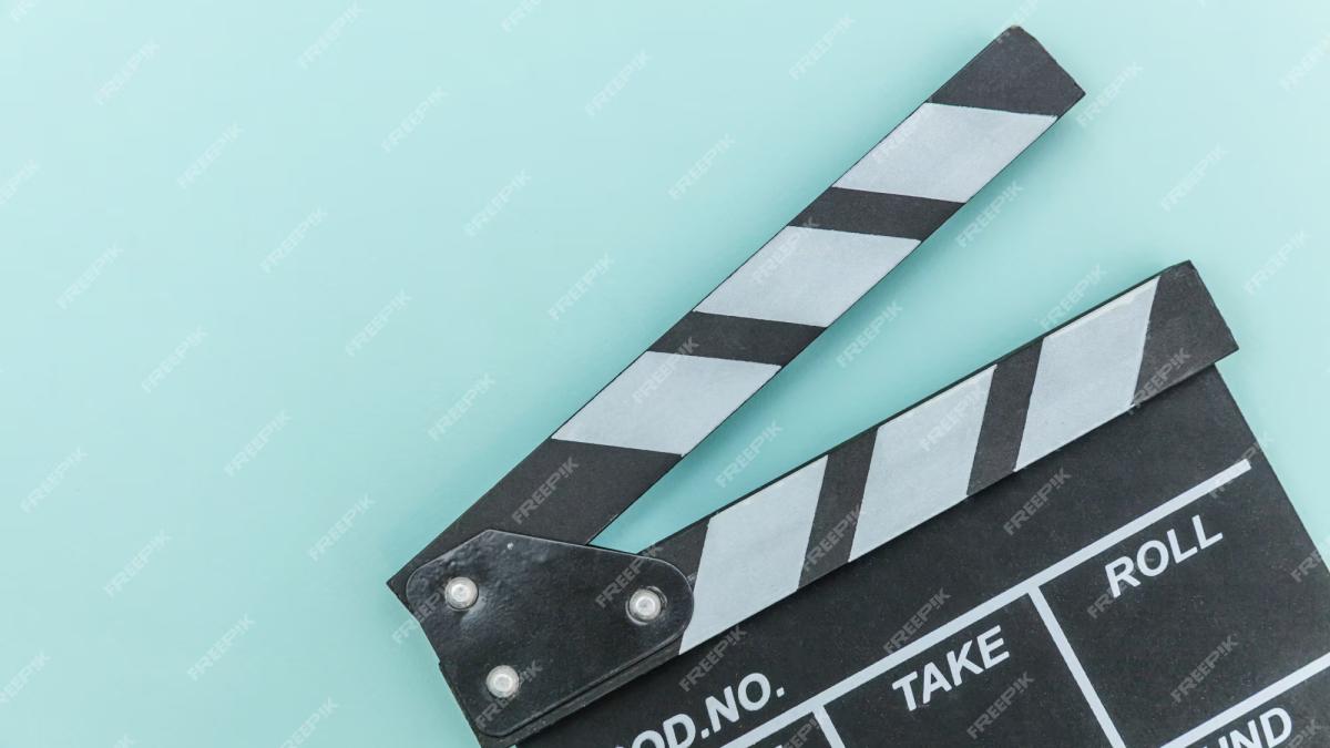 filmmaker-profession-classic-director-empty-film-making-clapperboard-movie-slate-isolated-blue-wall-video-production-film-cinema-industry-concept-flat-lay-top-view-copy-space_80942-1982-copy_81076200
