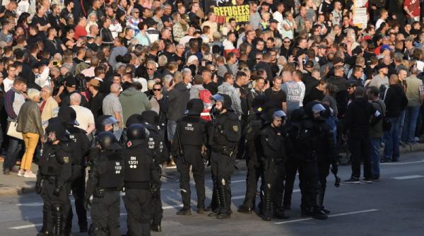 Germania: Violențe fără precedent. Autoritățile germane, criticate după difuzarea mandatului de arestare