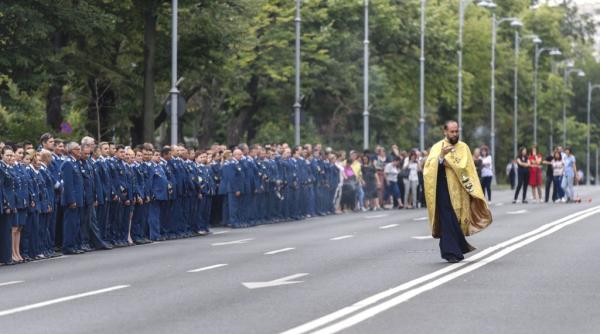 Un preot român, acceptat să ofere asistenţă duhovnicească militarilor canadieni