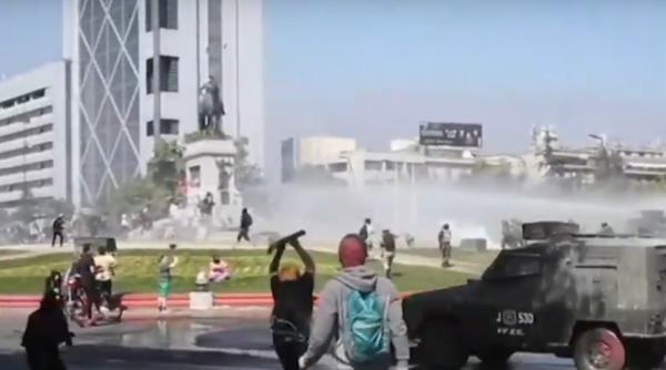 23 de COPII ROMÂNI, PRINȘI în mijlocul VIOLENȚELOR din Chile