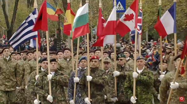 Un militar cu origini românești duce drapelul Canadei la parada de 1 Decembrie