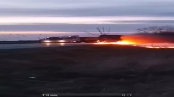 Un microbuz cu 10 români la bord a luat foc în mers