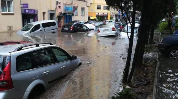 Copilul român luat de viitură cu tot cu mașină a fost găsit