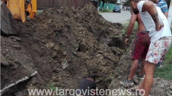  UPDATE. Trei muncitori români, îngropați DE VII sub un mal de pământ. Unul A MURIT