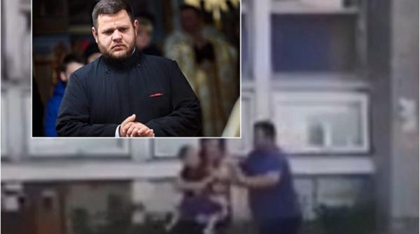 Preot român, filmat când își bate soția cu copilul în brațe (VIDEO)