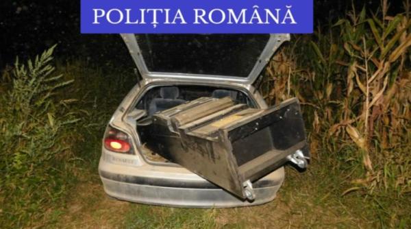 Un român ieșit dintr-un magazin cu... un aparat de păcănele: L-a dus pe câmp să-l spargă pentru a scoate banii