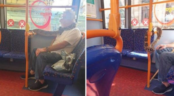 Un britanic a folosit un șarpe pe post de mască. Reacţia călătorilor