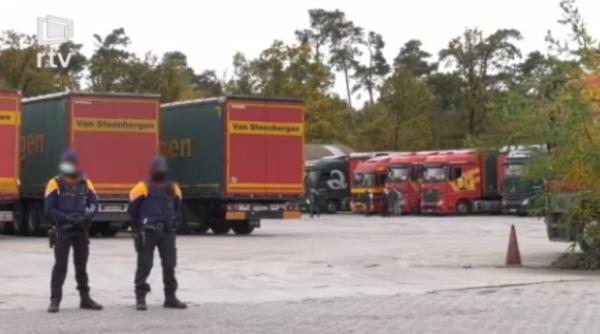 Acuzații grave și trafic de persoane, în Belgia. Zeci de șoferi români păcăliți: „Dorm în containere în 'Mica Românie'“