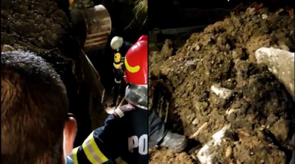 Doi români, surprinşi de prăbuşirea unui mal de pământ la Râmnicu Vâlcea