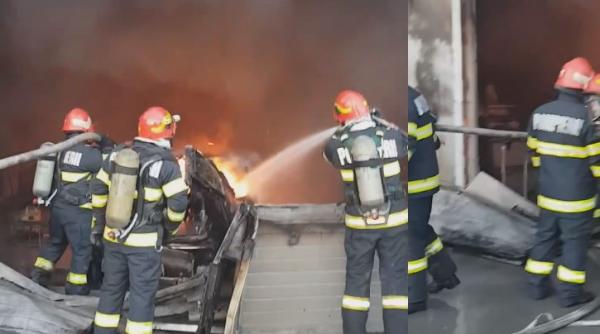 Doi români au rămas pietoni. Automobilele, distruse de un incendiu la un service auto din Craiova