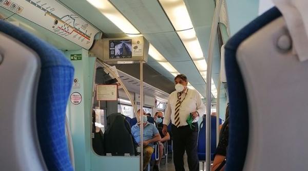 Germania. 14 muncitori români au urcat în tren fără măști și bilete. Au coborât cu... dosare penale