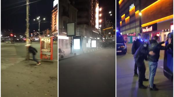Centrul Bucureștiului, DEVASTAT de huligani. Au aruncat cu bolovani în Jandarmi și au distrus automate - VIDEO