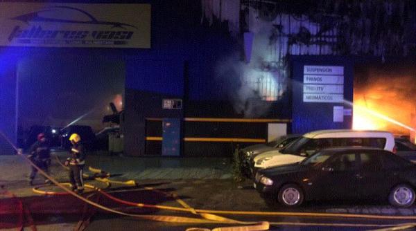 Spania. ATAC la un service românesc. I-au dat foc pentru că românul avea prețuri prea mici