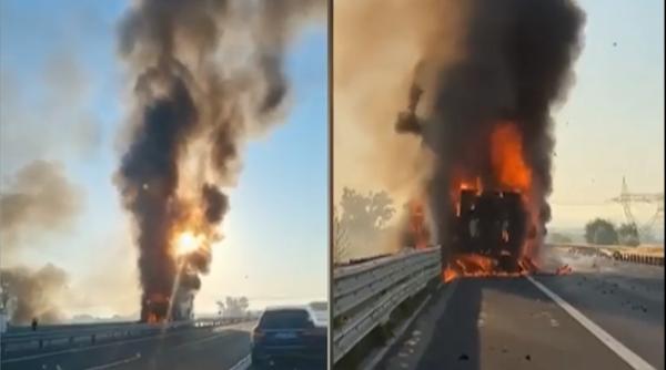 Flăcări uriașe pe A1, după ce un TIR încărcat cu băuturi s-a răsturnat și a luat foc