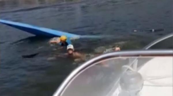 Caiac cu sportivi, lovit de o barcă de agrement plină cu turiști, la Orșova 