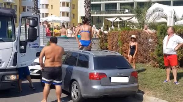 Bulgaria. O familie de români a făcut scandal: Femeia s-a urcat pe mașină pentru a împiedica autoritățile să i-o ridice - VIDEO
