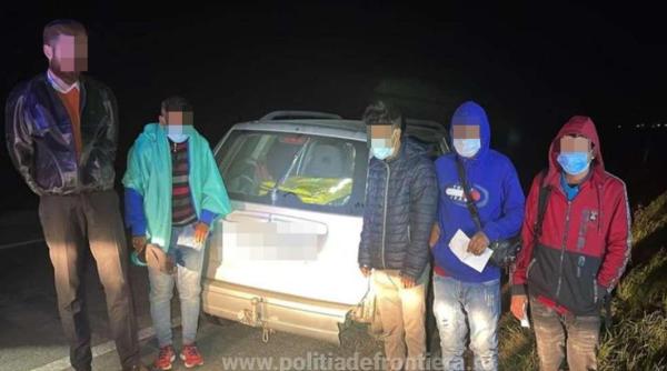 Doi români, călăuze pentru șapte migranți, s-au ales cu dosare penale