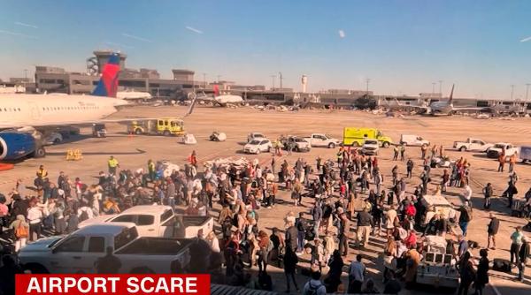 Teroare pe aeroport, după ce arma unui pasager s-a descărcat accidental: Două persoane, duse de urgență la spital