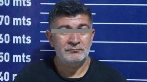 Jan, liderul unei rețele de români, experți în fraude bancare, extrădat de Venezuela cu o condiție pusă României