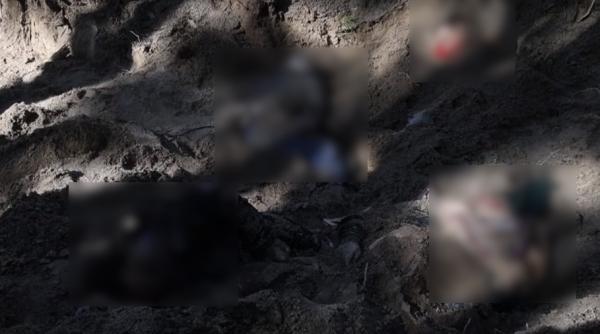 Ies la iveală noi crime ale soldaților ruși: Cinci cadavre descoperite la Motîjîn, printre care cele ale familiei primăriţei - VIDEO