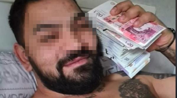 Marea Britanie. Român, condamnat la închisoare, după ce s-a filmat cu teancuri de bani pe TikTok