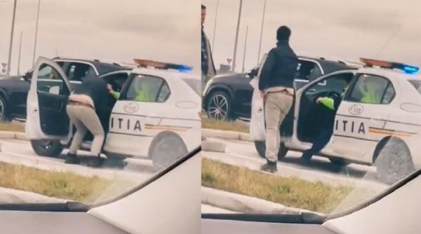 Polițist, umilit de un șofer care a intrat peste el în mașină să-i smulgă actele. Godină: Mi-e jena să mă uit la acest video