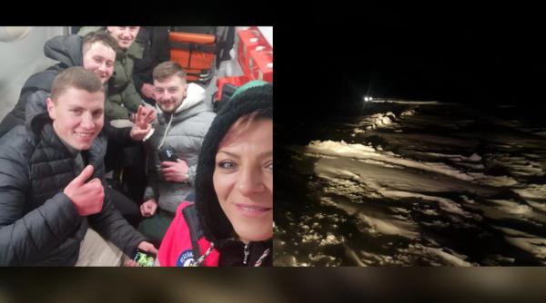 Ambulanţă rămasă în zăpadă, scoasă din nămeți de un grup de tineri români aflaţi la o petrecere: 'Doamne, hai că nu suntem pierduţi!'