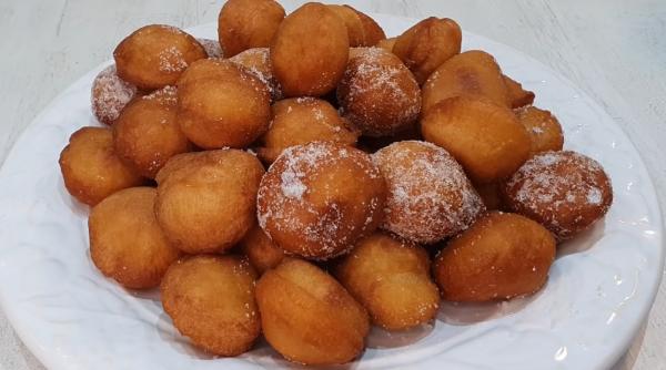 Gogoși cu portocale, fragede și pufoase. Sunt ușor de făcut și rezistă câteva zile în stare perfectă. Încearcă chiar azi această rețetă simplă!