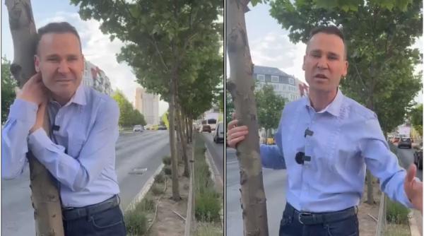 Imagini uluitoare cu primarul Sectorului 3. Negoiță ia în brațe un copac și îi ține lecții de ecologie lui Nicușor Dan: "Să vă ferească Dumnezeu, nu aveţi ce face aici" - VIDEO