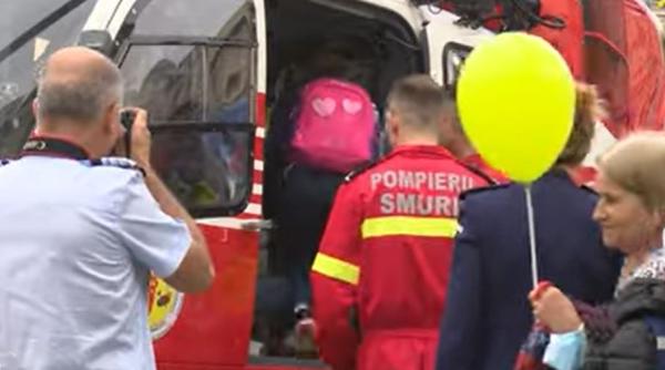 Ziua Porţilor deschise la MAI pentru copii: elicopter, motociclete, maşini de pompieri şi câini poliţişti