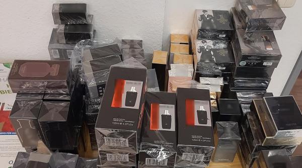 Parfumuri "de firmă" de 100 000 euro, găsite ascunse într-un TIR cu destinația București 