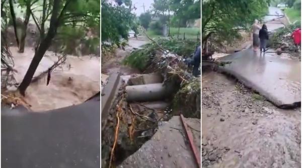 Ploi devastatoare în sud-vestul țării: Sute de case și terenuri agricole inundate, șosele închise, pod distrus de ape