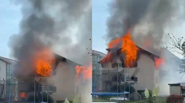 Trei muncitori români din Elveția au trecut pe lângă moarte. Casa de lemn, în care locuiau, cuprinsă de un incendiu violent