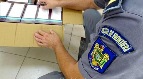 Camioane cu zeci de colete din Bulgaria, oprite la vamă. Polițiștii au găsit haine, genți și parfumuri contrafăcute de la branduri de lux