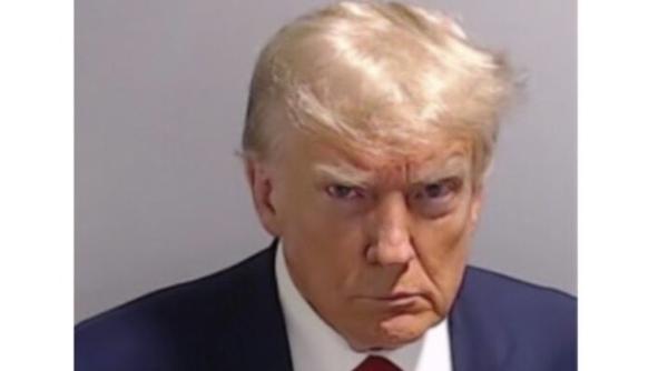 Donald Trump a revenit pe platforma X (fostă Twitter) postând fotografia făcută în închisoare - FOTO